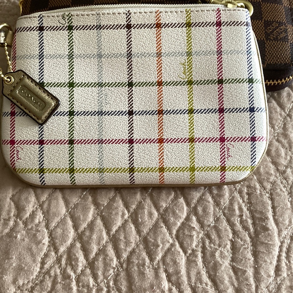 Cream leather wristlet with Gold trim and strap